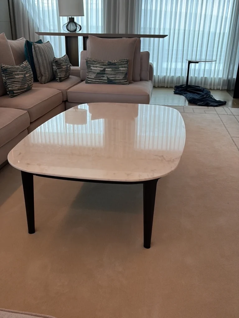 Polished marble coffee table, saloon view
